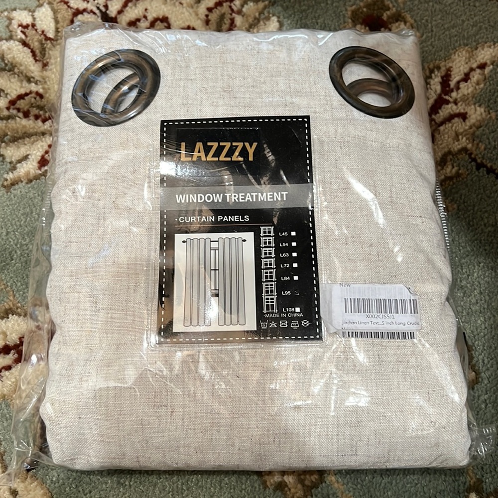 NWT pair of linen like taupe curtain panels with grommets - 95”L